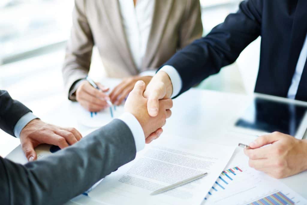 A client consulting with a registered agent service provider for their business.