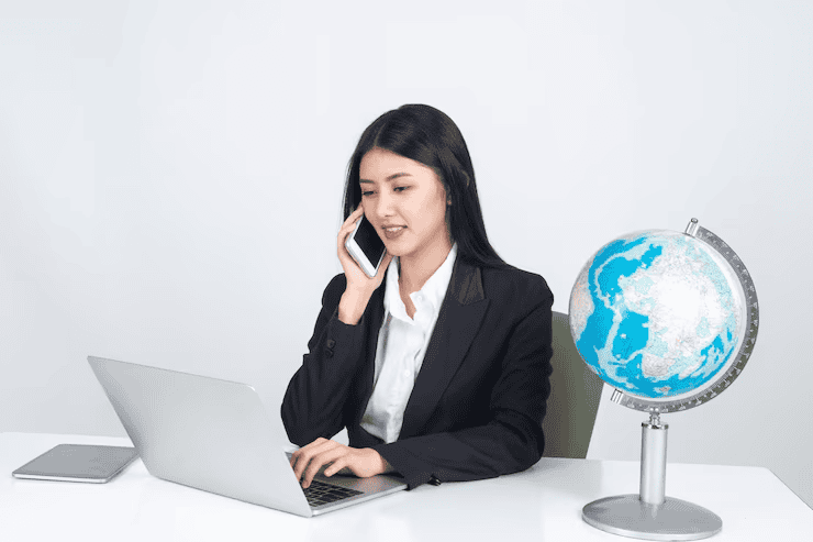 Professional woman on phone call, representing services of an international business registered agent.