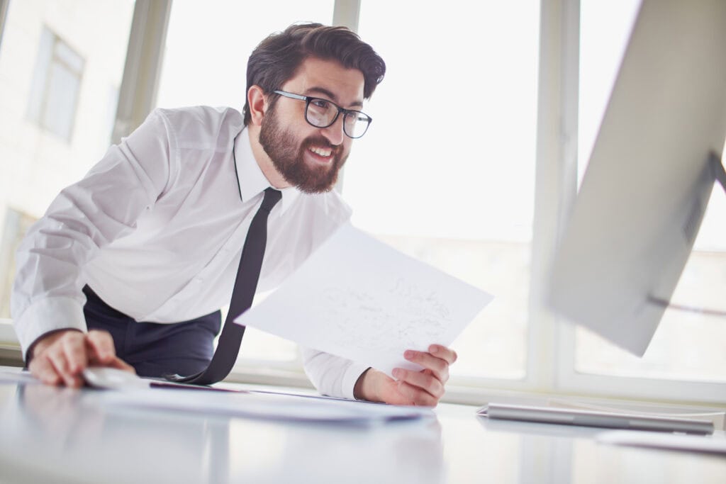 A man surfing answers for the primary Georgia LLC Documents.
