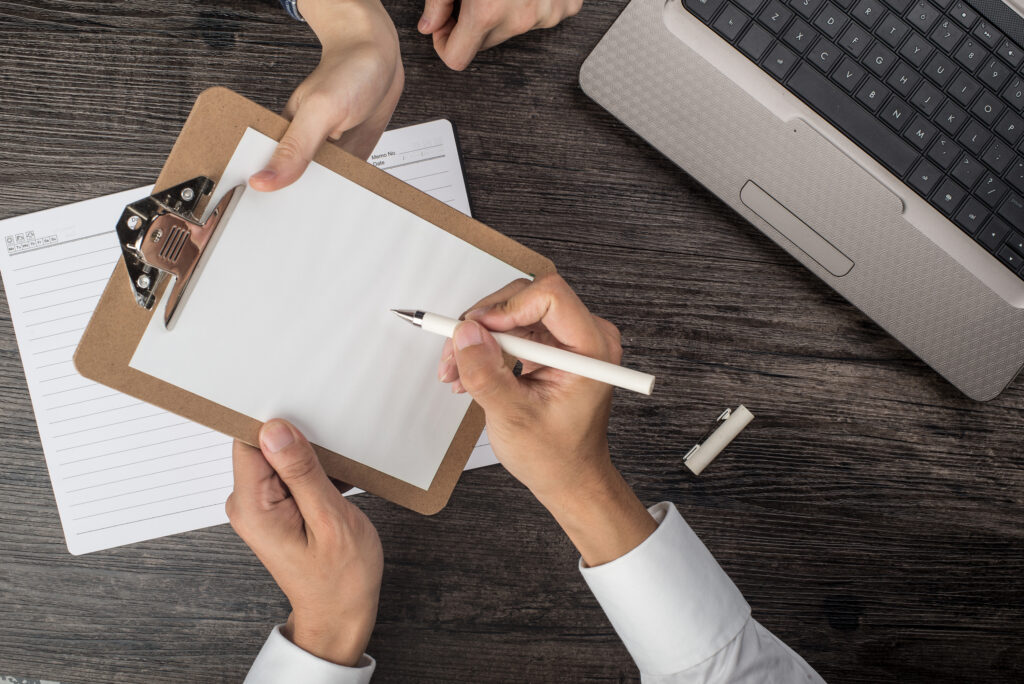 Business owners working on California LLC documents.