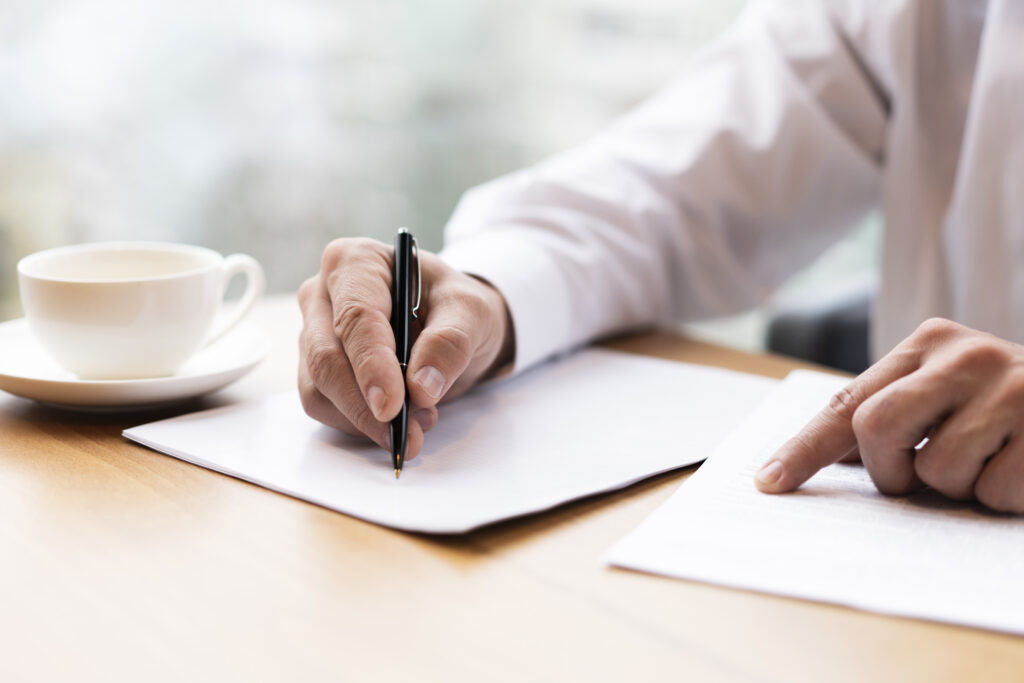 Entrepreneur filling out Illinois LLC documents.