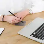 Entrepreneur filling out Montana LLC documents.