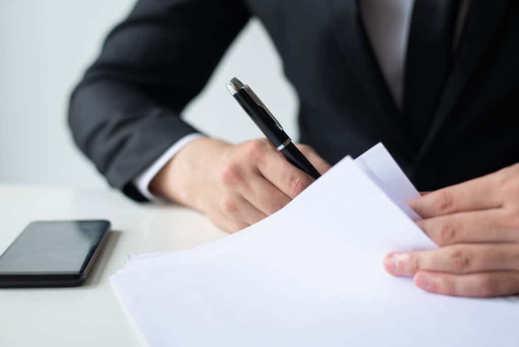 Entrepreneur filling out Oregon LLC documents.