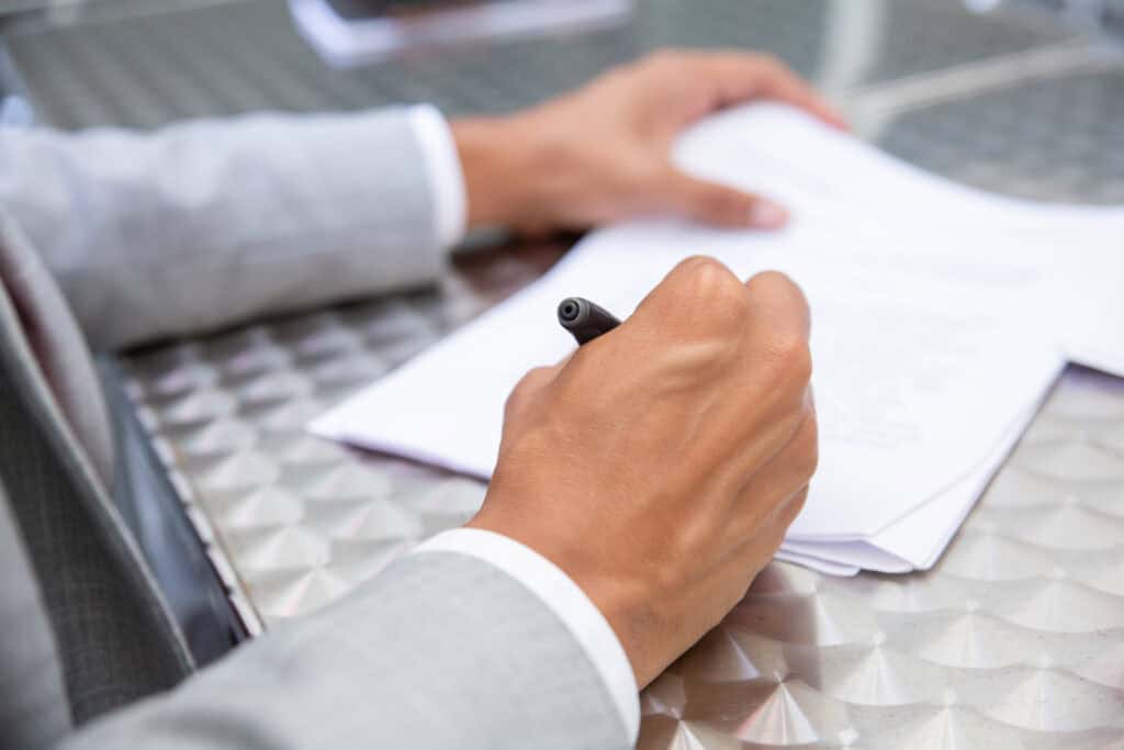Entrepreneur filling out Colorado LLC documents.