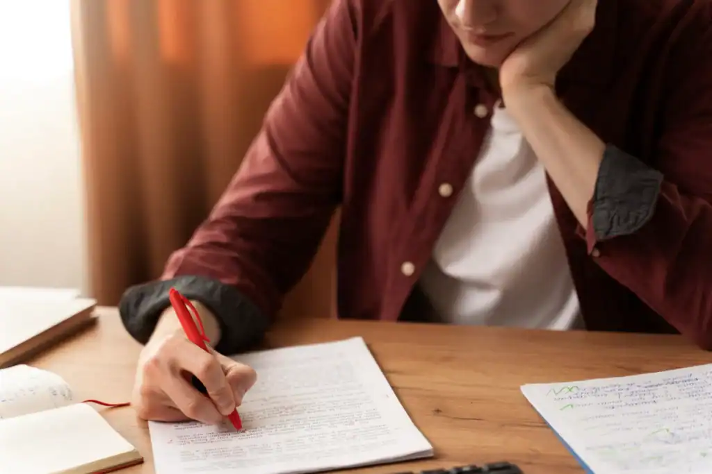 Entrepreneur filling out Michigan LLC documents.