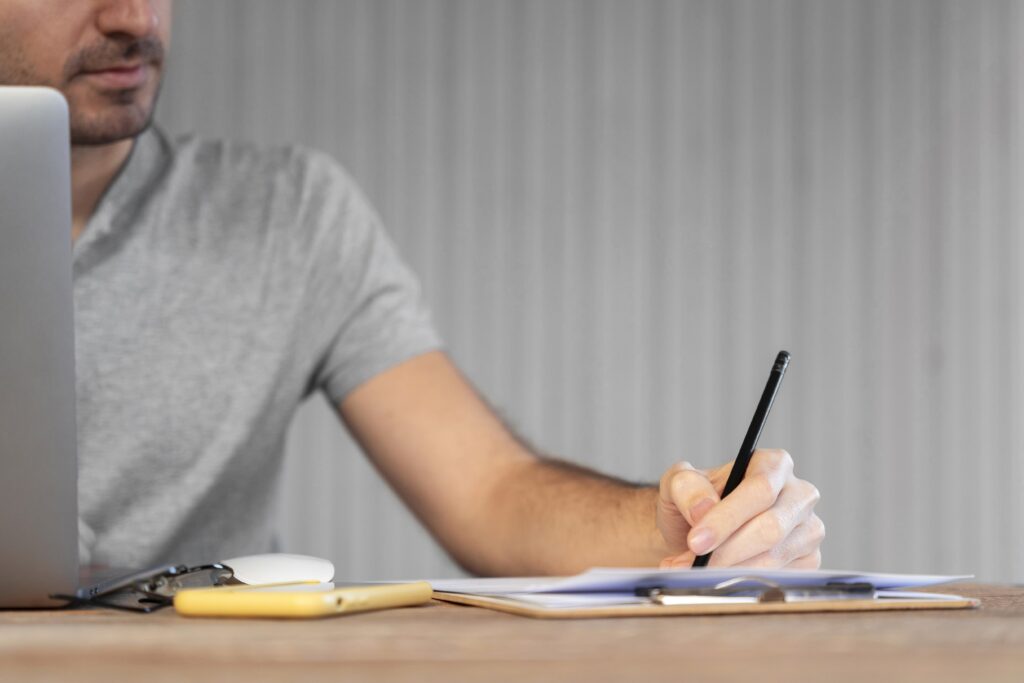 Entrepreneur filling out Rhode Island LLC documents.