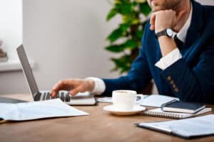 Entrepreneur answering common registered agent FAQs.